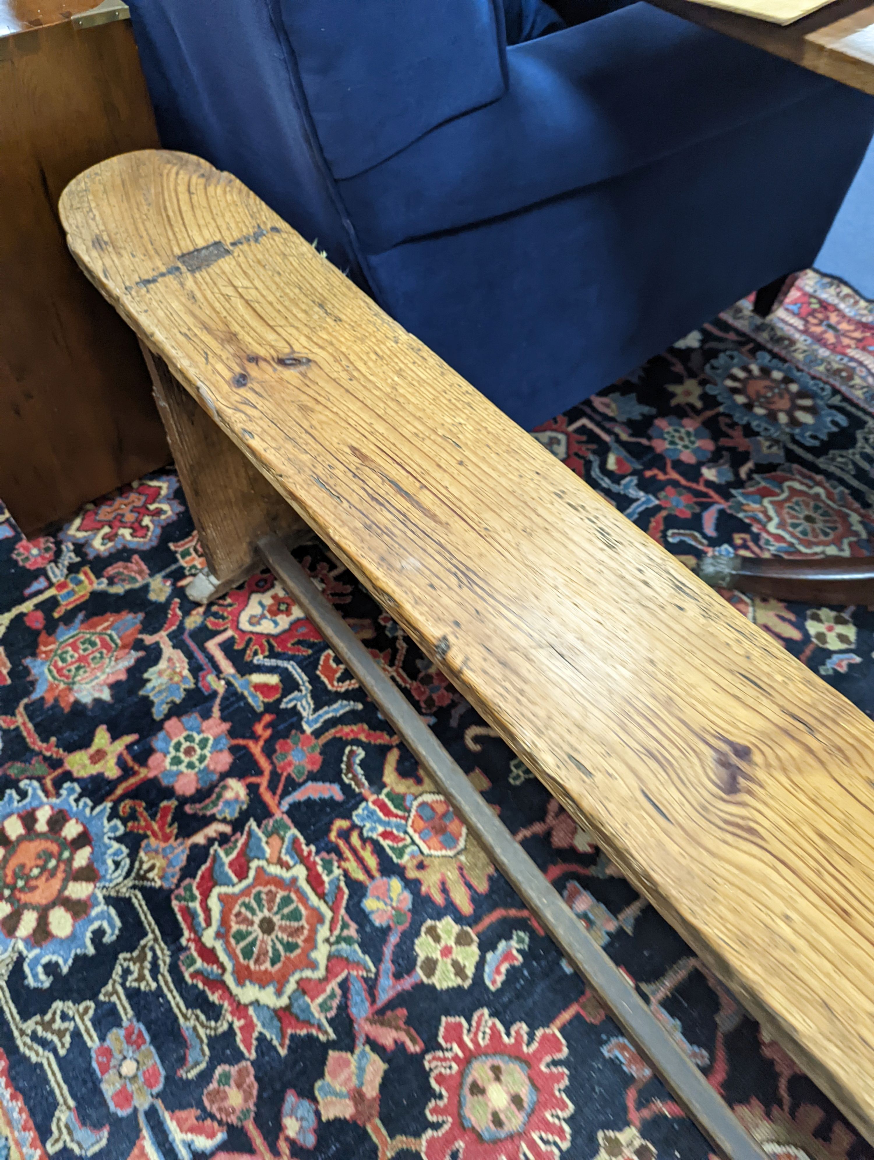 An 18th century pine bench, length 162cm, height 49cm